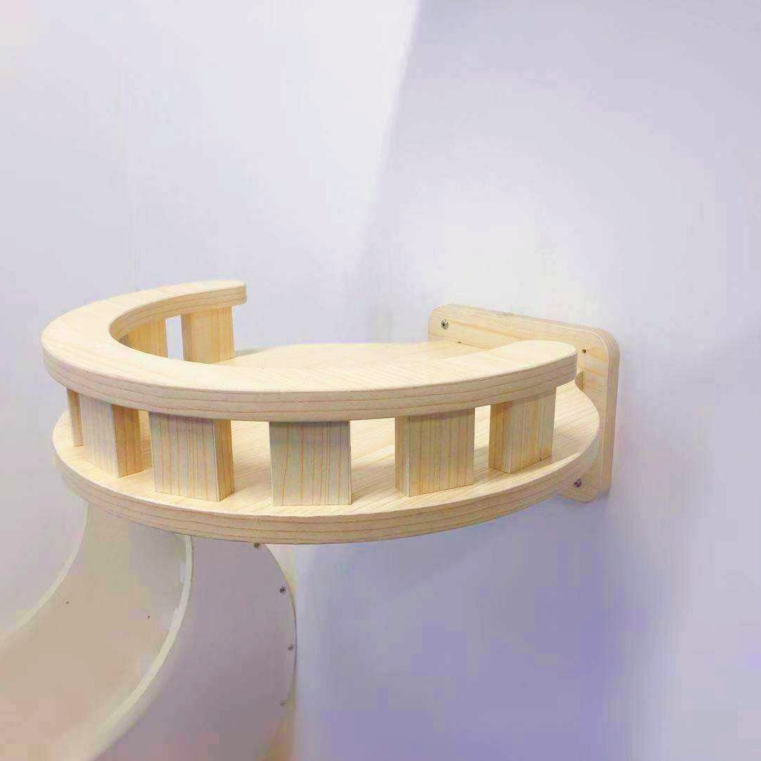 Solid wood wall-mounted cat climbing platform designed for climbing and resting with a sturdy curved design.
