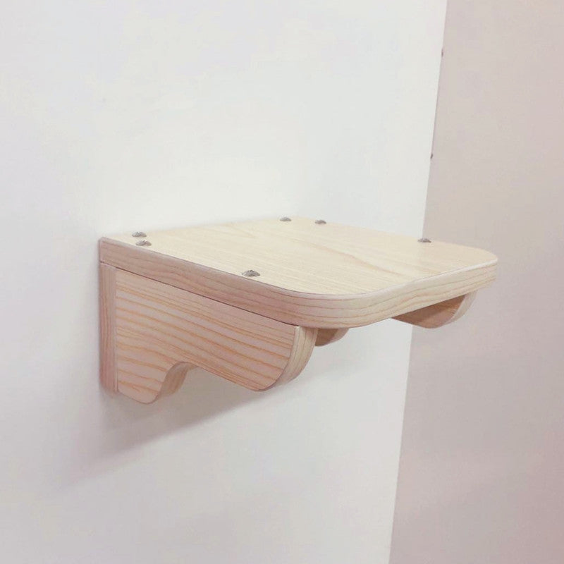 Solid wood wall-mounted cat climbing platform for cats to climb and perch on, enhancing vertical space in your home.